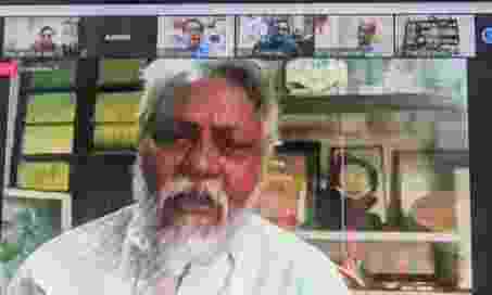 Image shows Dr Rajendra Singh speaking at an online meeting
